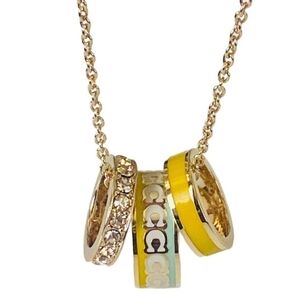 Coach Gold and Yellow Pendant Necklace